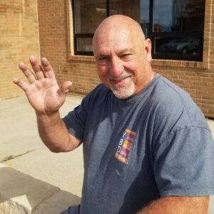 landscape supply store employee with YBD shirt